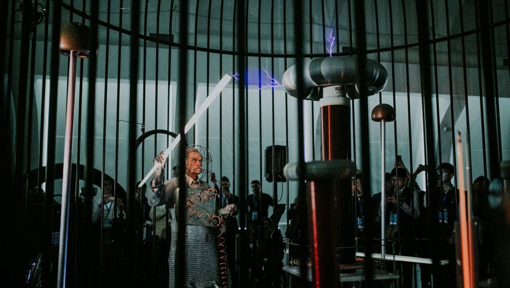 Bringing EU’s Contest for Young Scientists to life Old man holding a stick, part of large scientific experiment