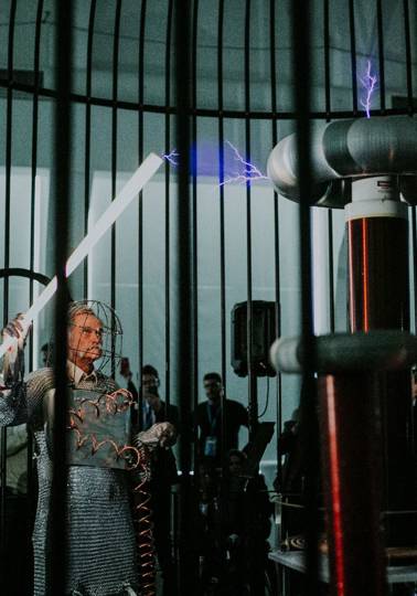 Bringing EU’s Contest for Young Scientists to life Old man holding a stick, part of large scientific experiment