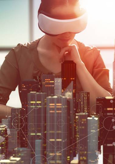 Spreading the word about EU research Two people blindfolded sitting in front of a model of a city skyline