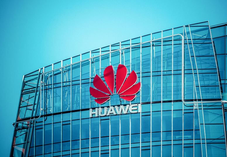 Glass building façade with company logo