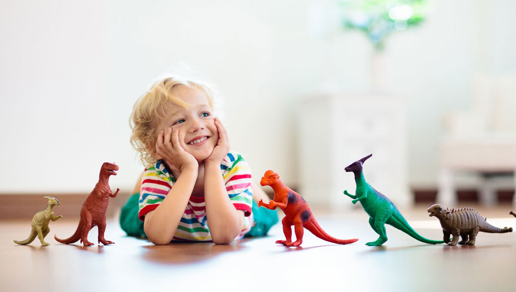 International Product Safety Week 2020 Child playing with dinosaur toys
