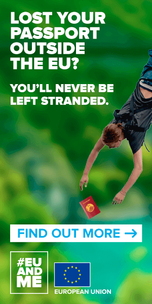 Person hanging upside down from bungee rope with passport falling out of pocket.