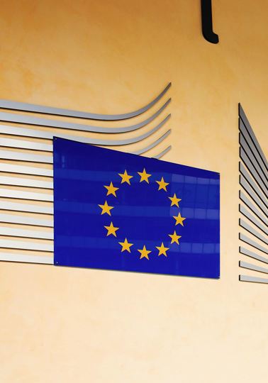 Wall with EU flag and logo at Berlaymont building